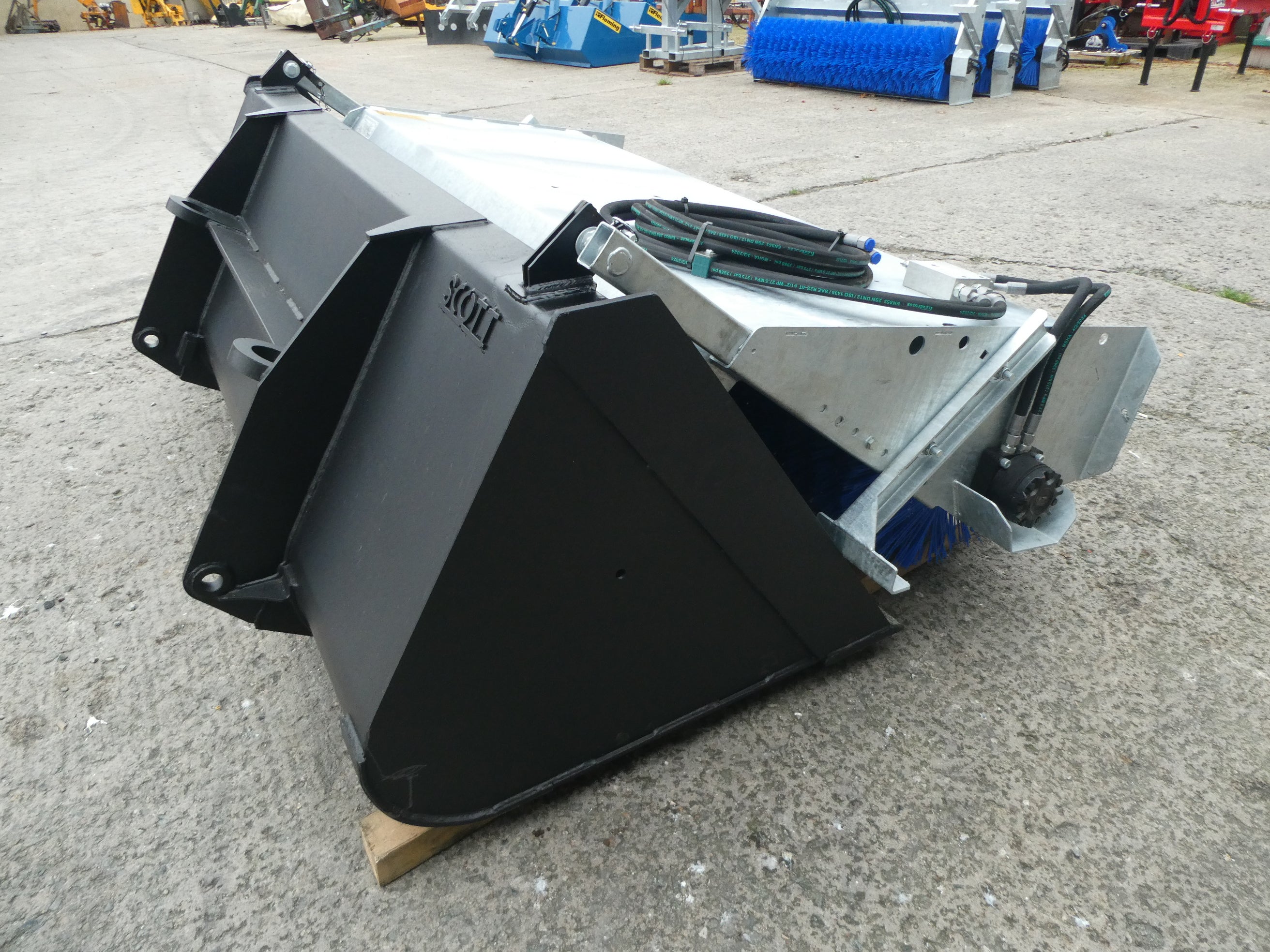 Suton Bucket Brush mounted on bucket