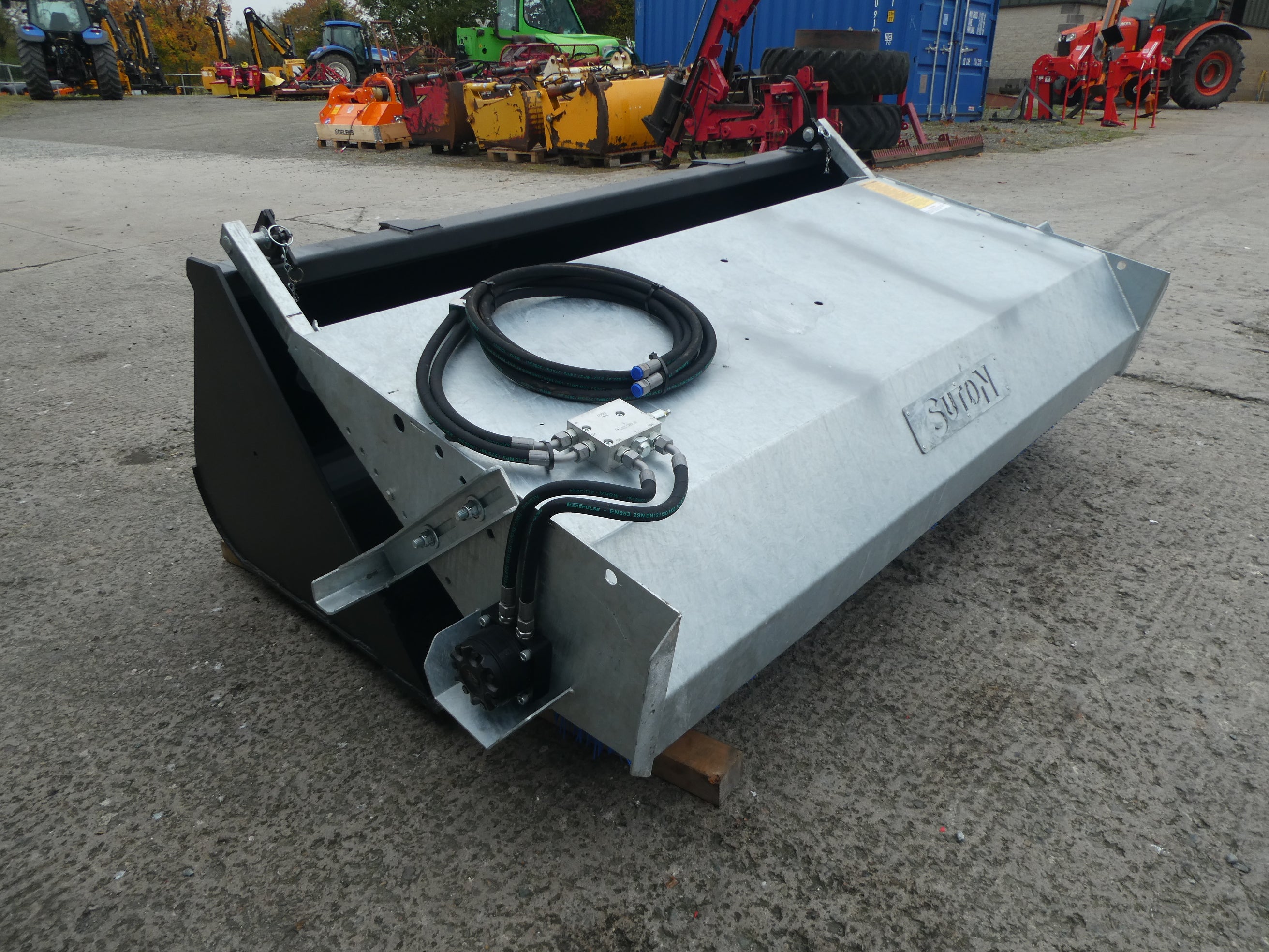 Suton Bucket Brush mounted on bucket