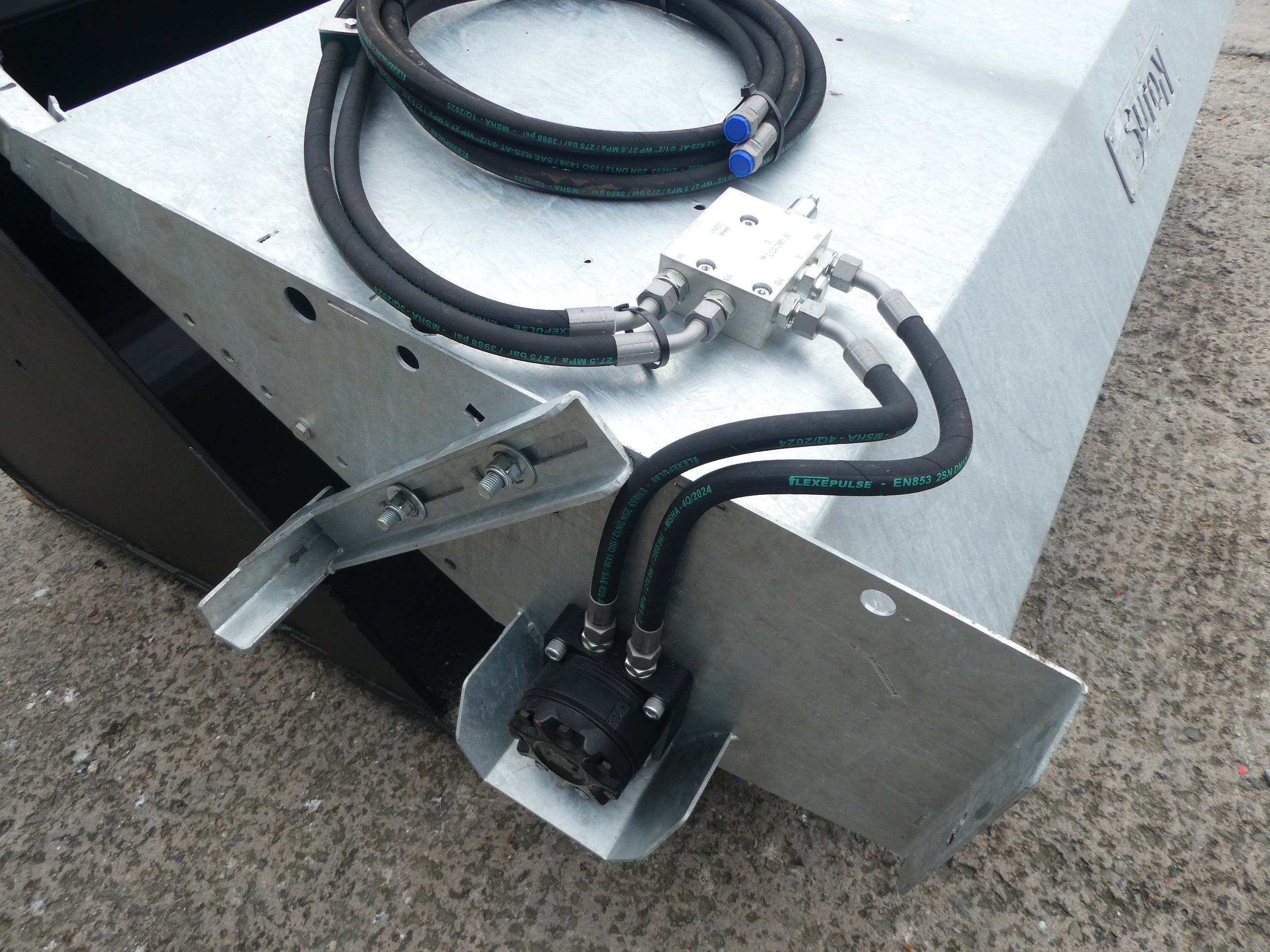 Suton Bucket Brush mounted on bucket