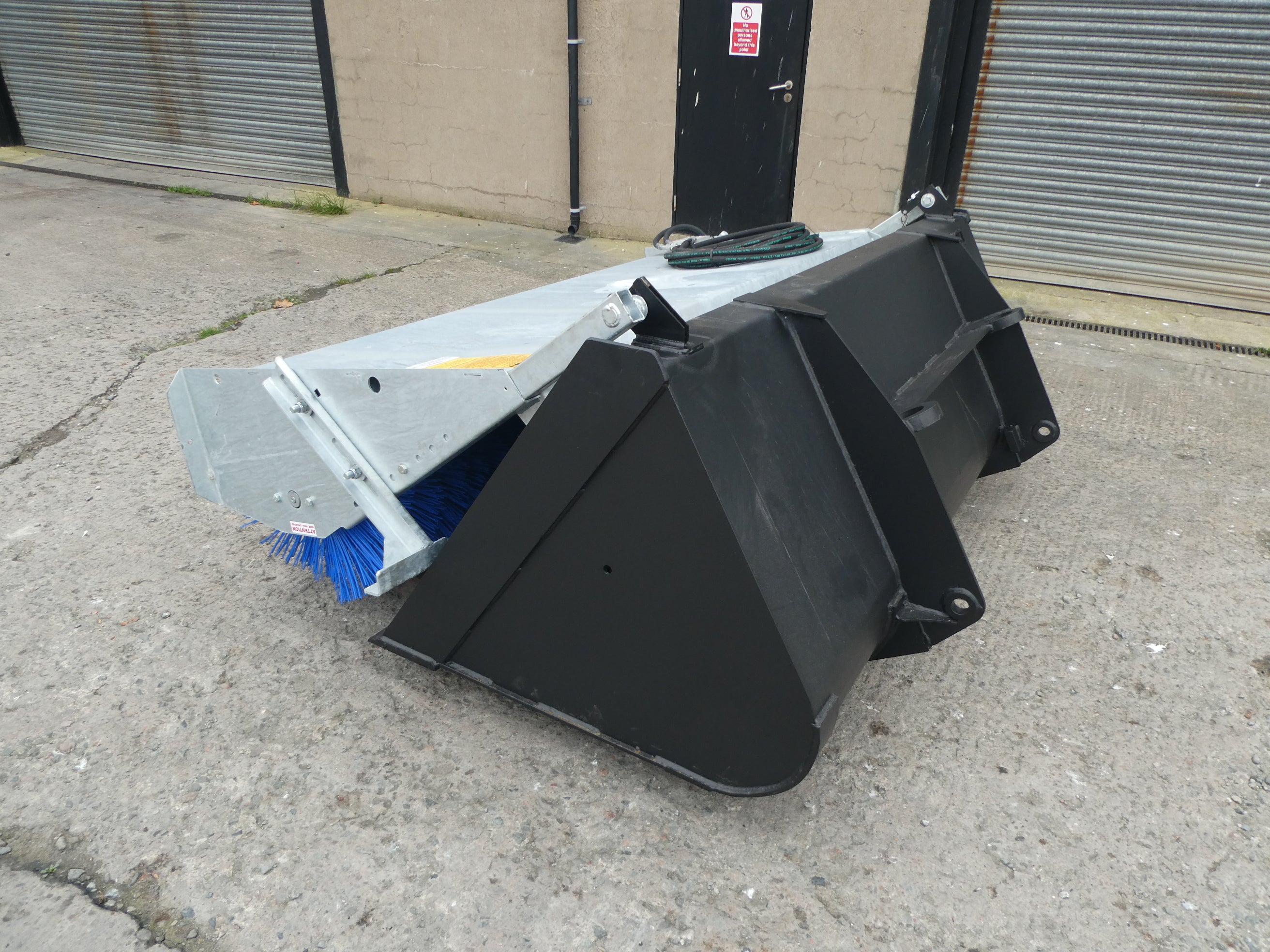 Suton Bucket Brush mounted on bucket