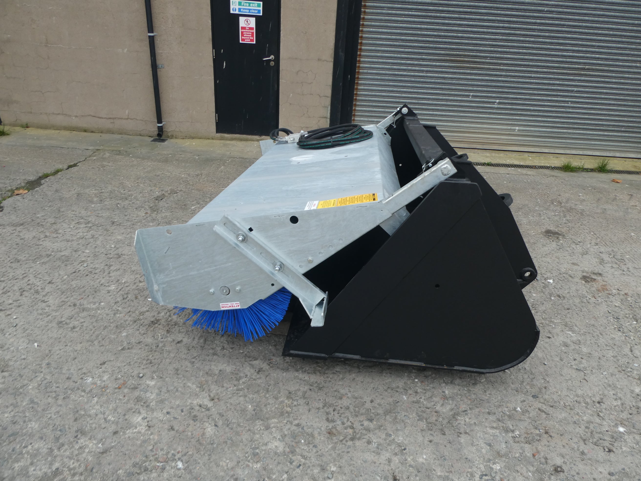 Suton Bucket Brush mounted on bucket