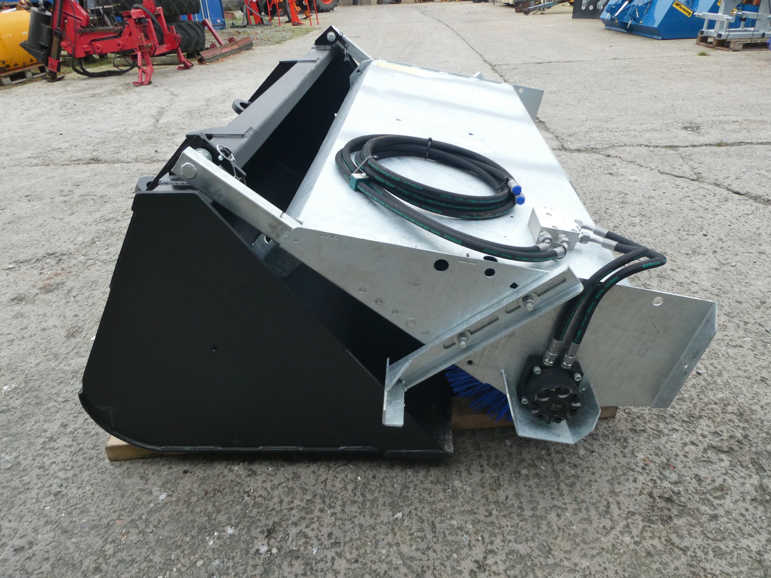 Suton Bucket Brush mounted on bucket